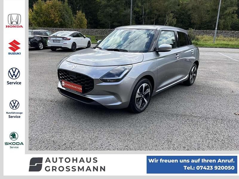 Premium silver metallic Neu 2025 Suzuki Swift Comfort+ Kleinwagen | 20.480 € - Bild 1/4
