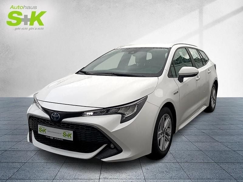 Schneeweiß Gebraucht 2021 Toyota Corolla Business Edition Kombi | 21.390 € (Fairer Preis) - Bild 1/4