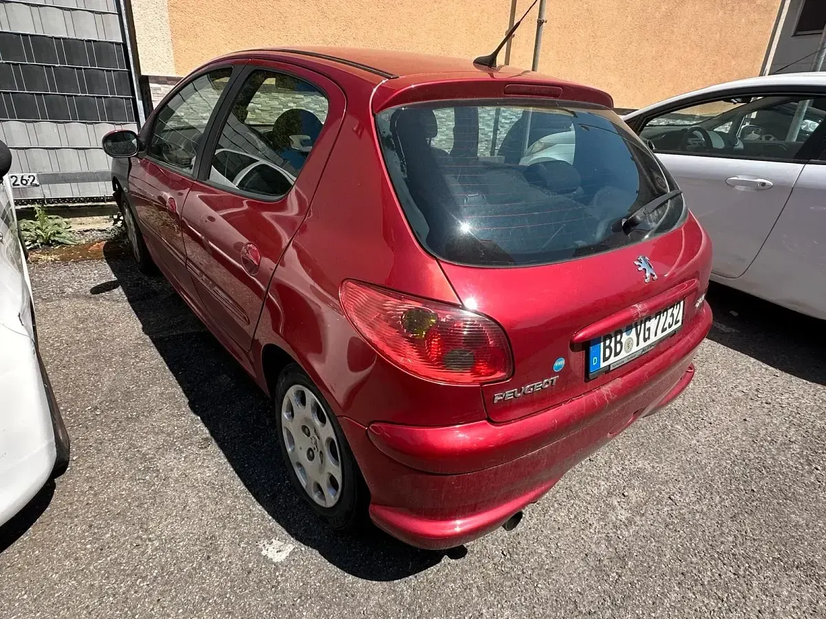 Gebraucht Peugeot 206 75 PS (55 kW) 2003 Rot Kleinwagen
