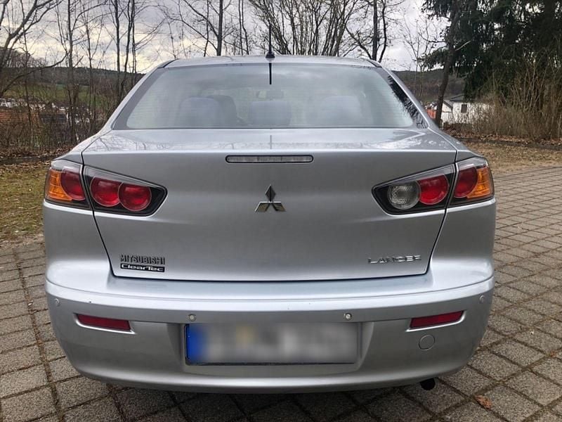 Gebraucht Mitsubishi Lancer 117 PS (86 kW) 2012 Silber Limousine