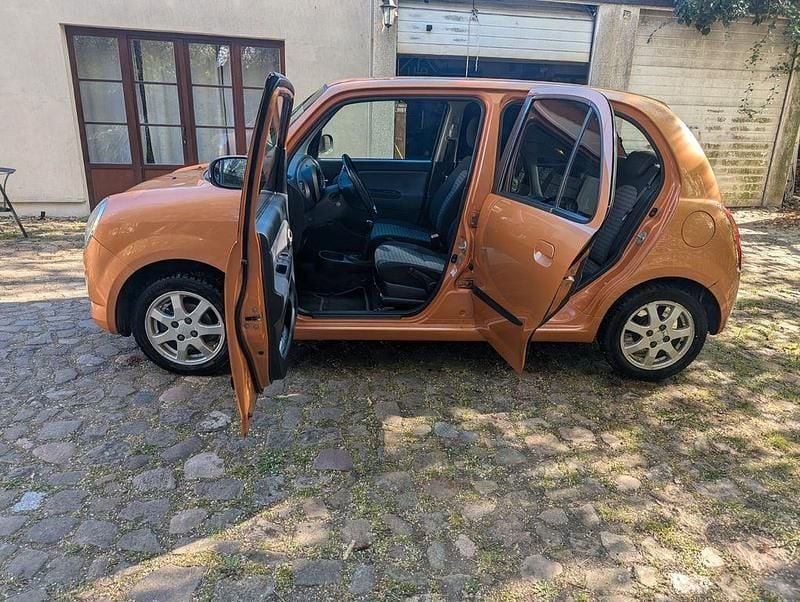Gebraucht Daihatsu Trevis 58 PS (42 kW) 2006 Orange Kleinwagen