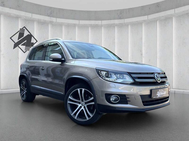 Titanium beige metallic Gebraucht 2013 VW Tiguan Sportline SUV | 21.490 € (Teuer) - Bild 1/4