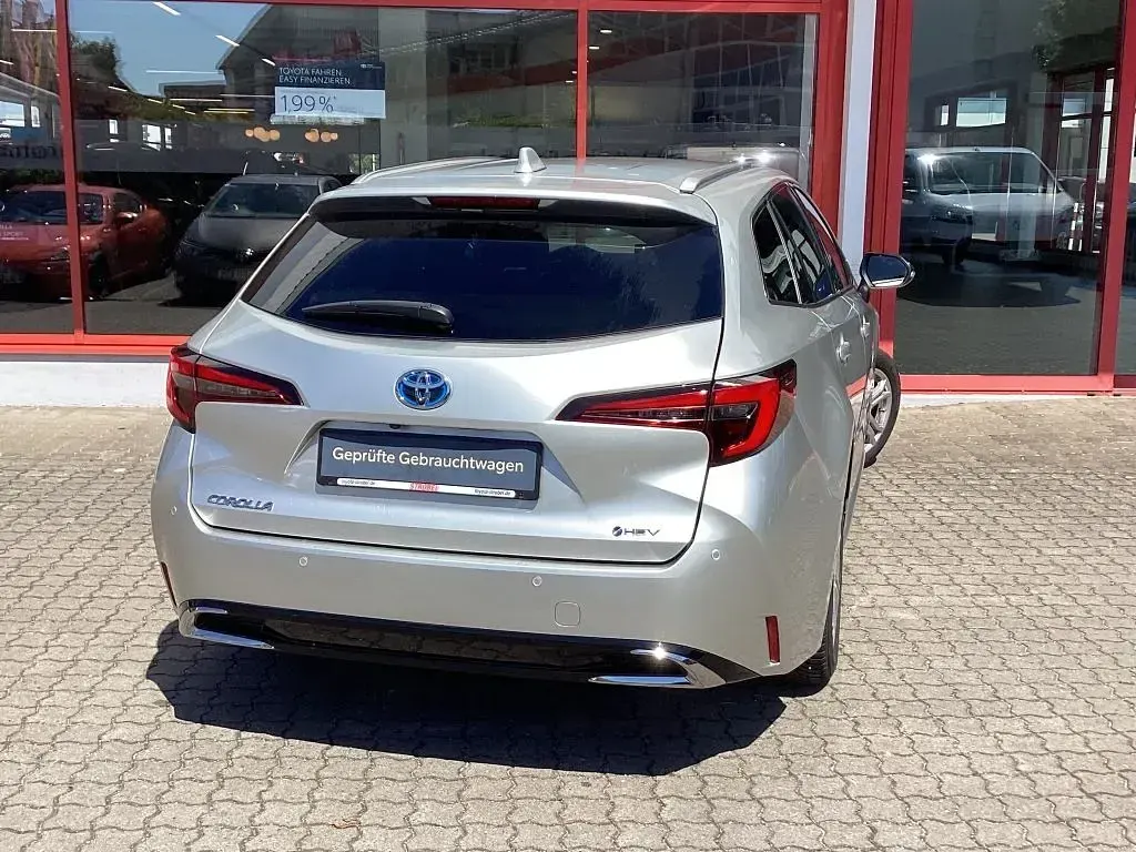 Gebraucht Toyota Corolla 196 PS (144 kW) 2025 Cosmicsilber metallic Kombi