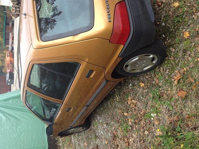 Gebraucht Peugeot 106 60 PS (44 kW) 1997 Gelb Kleinwagen