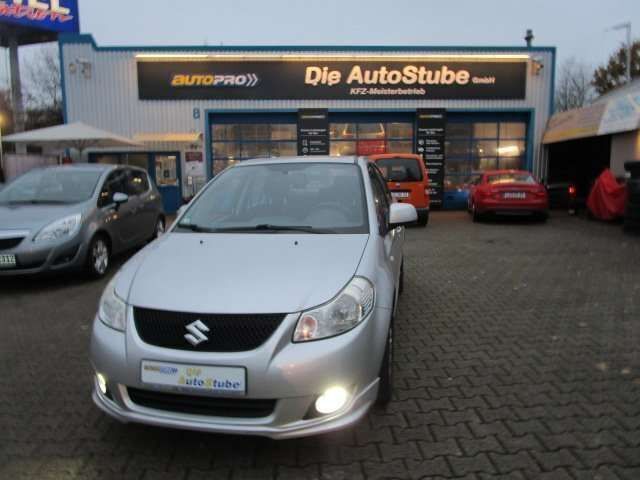 Silber Gebraucht 2010 Suzuki SX4 Comfort Limousine | 6.990 € (Etwas zu teuer) - Bild 1/4