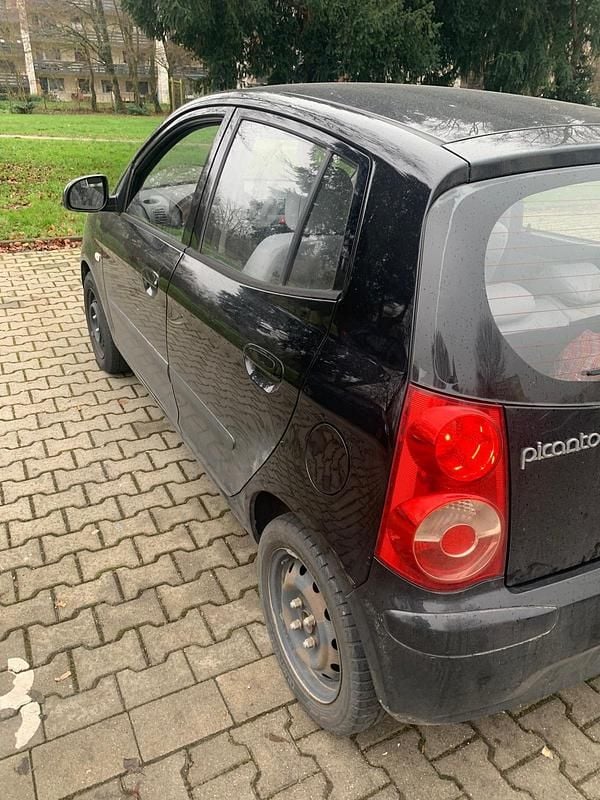 Second-hand Kia Picanto 65 CP (47 kW) 2011 Negru Hatchback