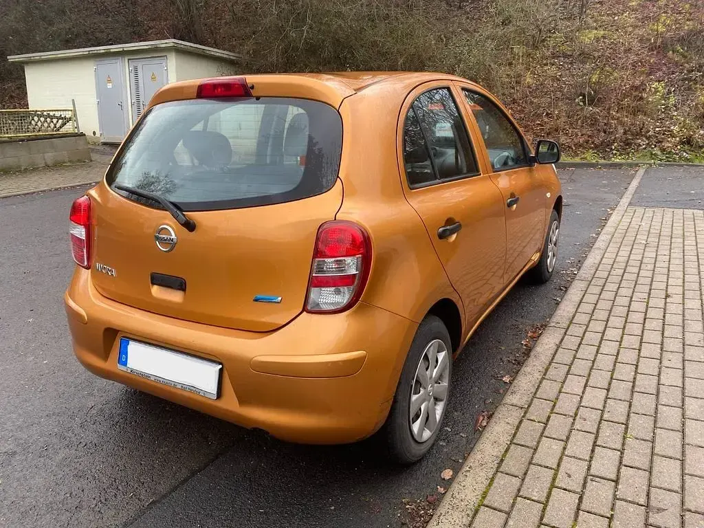 Gebraucht Nissan Micra 80 PS (58 kW) 2012 Orange Kleinwagen