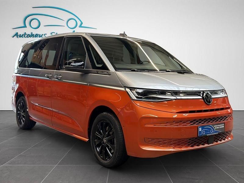 Używany VW T7 Style 150 KM (110 kW) 2024 Pomarańczowy Van