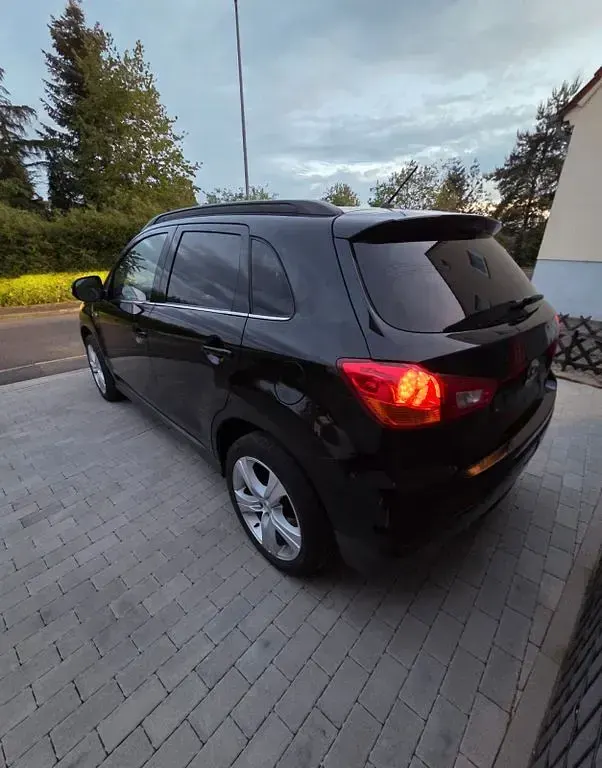Używany Mitsubishi ASX Invite 150 KM (110 kW) 2011 Czarny SUV