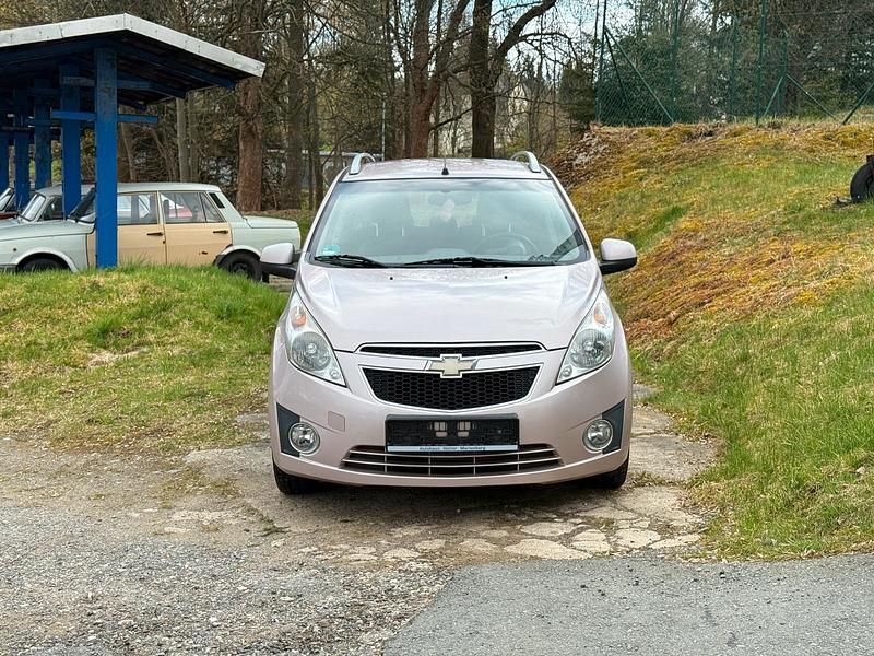 Second-hand Chevrolet Spark 82 CP (60 kW) 2012 Roșu Hatchback