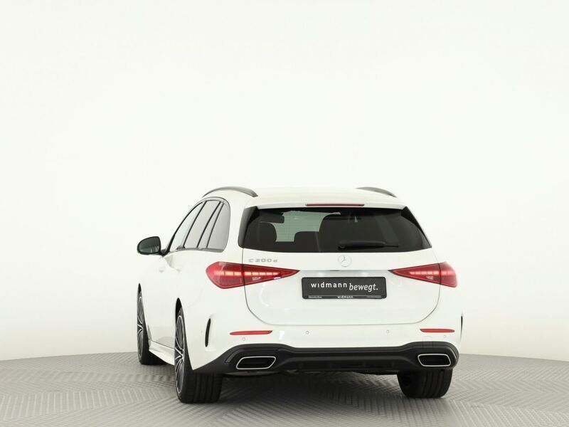 Gebraucht Mercedes C200 AMG 163 PS (119 kW) 2024 Unilack polarweiß Kombi