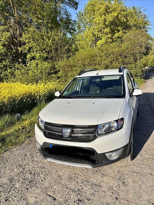 Używany Dacia Sandero Prestige 90 KM (66 kW) 2014 Biały Hatchback