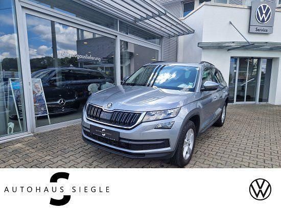 Business grau (metallic) Gebraucht 2020 Skoda Kodiaq Ambition SUV | 23.940 € (Fairer Preis) - Bild 1/4