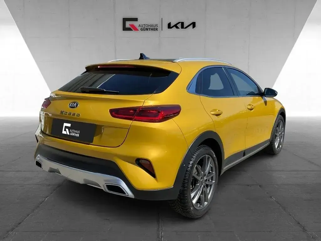 Gebraucht Kia XCeed Xdition 204 PS (150 kW) 2021 Yqm) quantum yellow m (gelb SUV