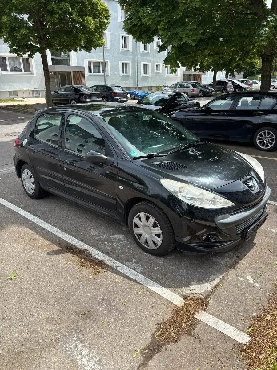 Gebraucht Peugeot 206 73 PS (53 kW) 2011 Schwarz Kleinwagen