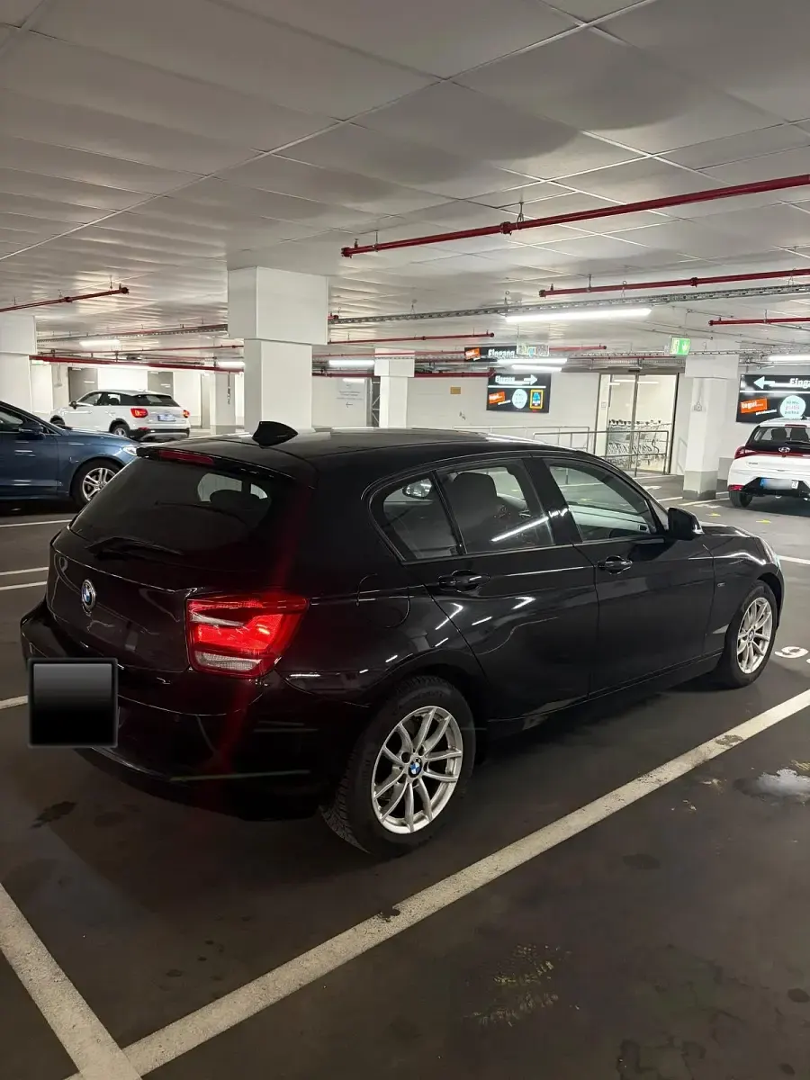 Gebraucht BMW 118 Sport Line 170 PS (125 kW) 2011 Schwarz Kleinwagen
