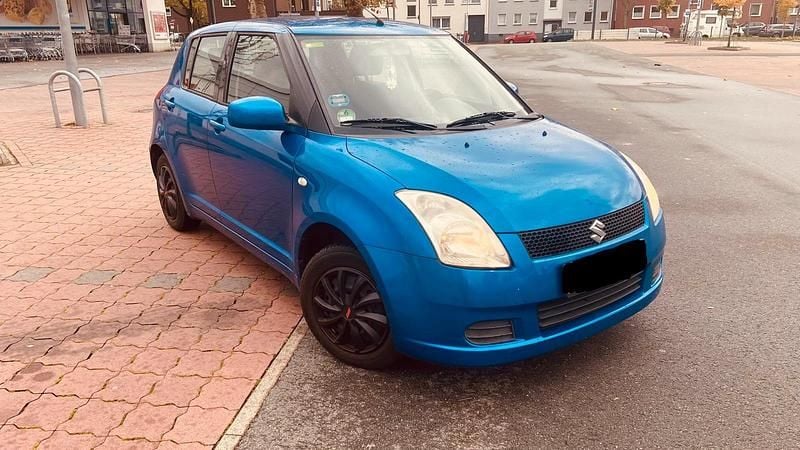 Blau Gebraucht 2006 Suzuki Swift Kleinwagen | 3.990 € (Fairer Preis) - Bild 1/4