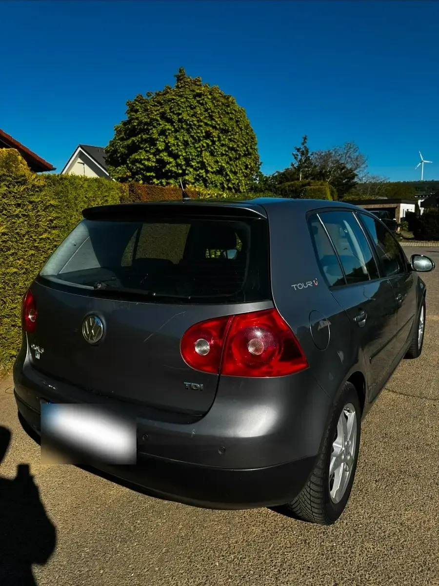 Second-hand VW Golf V 105 CP (77 kW) 2007 Alb Break