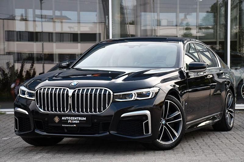 Black sapphire metallic Gebraucht 2021 BMW 745e M Sport Limousine | 50.970 € (Fairer Preis) - Bild 1/4