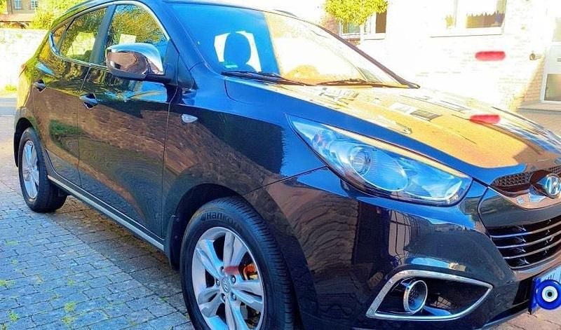 Schwarz Gebraucht 2011 Hyundai Tucson SUV | 7.200 € - Bild 1/4