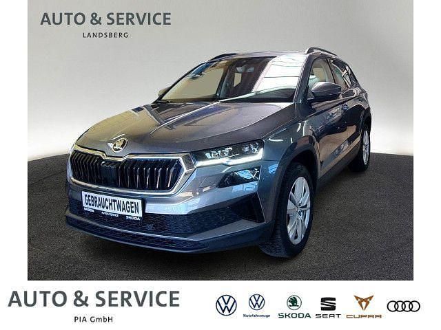 Graphitegrau metallic Gebraucht 2024 Skoda Karoq Selection SUV | 32.390 € (Fairer Preis) - Bild 1/4