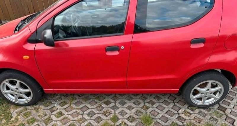 Gebraucht Nissan Pixo 68 PS (50 kW) 2011 Rot Kleinwagen