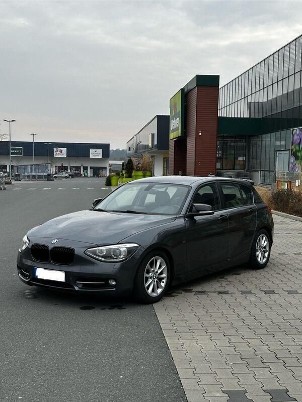 Grau Gebraucht 2013 BMW 118 Sport Line Kleinwagen | 12.390 € (Etwas zu teuer) - Bild 1/4
