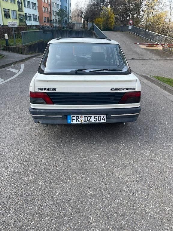 Gebraucht Peugeot 309 75 PS (55 kW) 1990 Weiß Kleinwagen