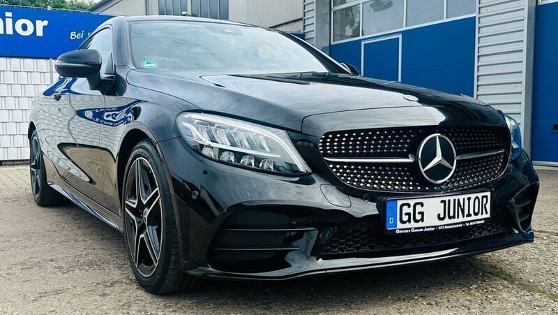 Schwarz Gebraucht 2023 Mercedes C300 AMG Coupé | 42.600 € (Superpreis) - Bild 1/4