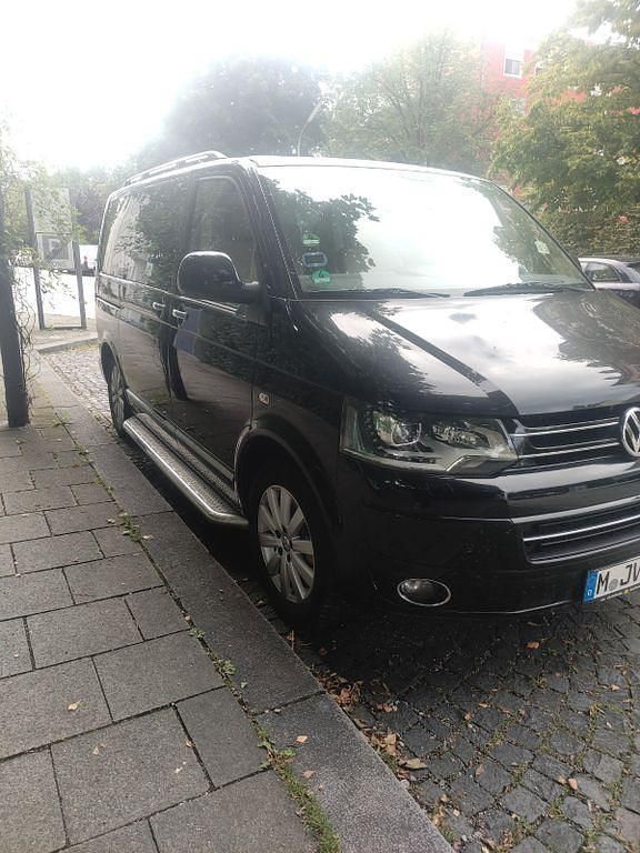 Second-hand VW Multivan Highline 179 CP (131 kW) 2012 Negru Monovolum