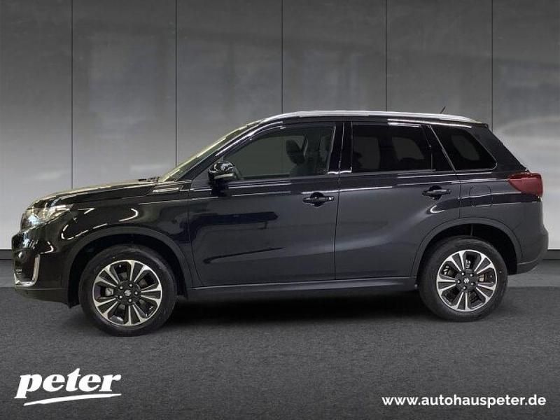 Gebraucht Suzuki Vitara Comfort 102 PS (75 kW) 2024 Cosmic black pearl met. SUV