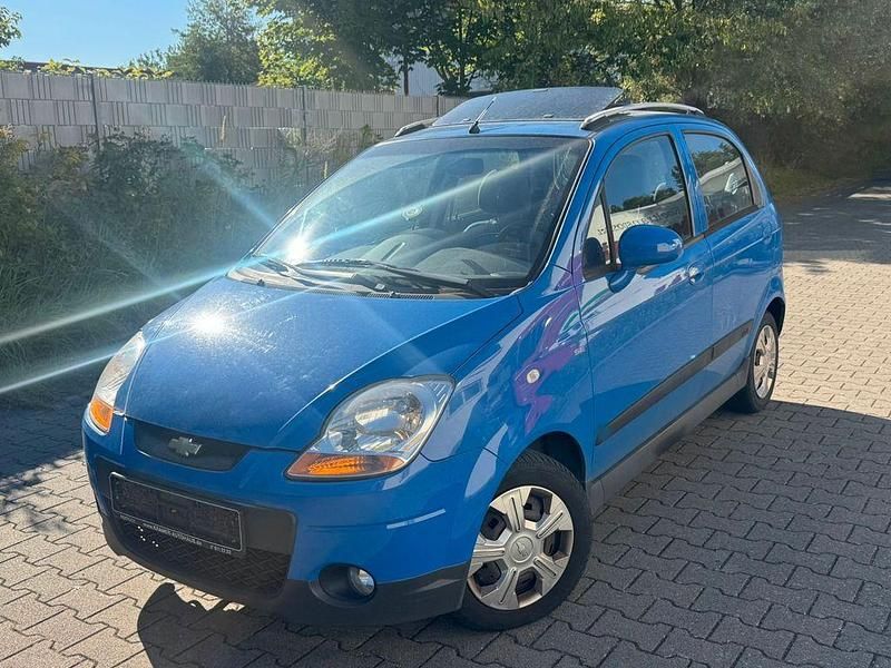 Blau Gebraucht 2009 Chevrolet Matiz SE Kleinwagen | 1.288 € (Fairer Preis) - Bild 1/4