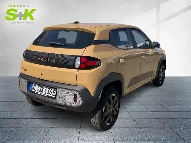 Używany Dacia Spring Extreme 48 kW (66 KM) 2025 Beżowy Hatchback