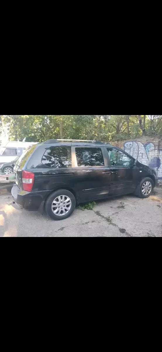 Gebraucht Kia Carnival 185 PS (136 kW) 2009 Schwarz Van / Kleinbus