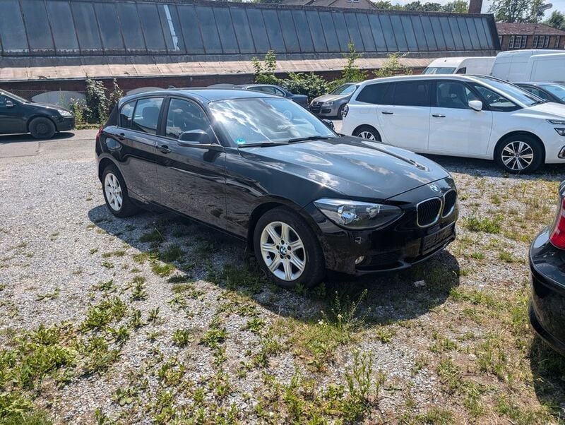 Schwarz Gebraucht 2012 BMW 116 Comfort Edition Kleinwagen | 10.500 € (Teuer) - Bild 1/4