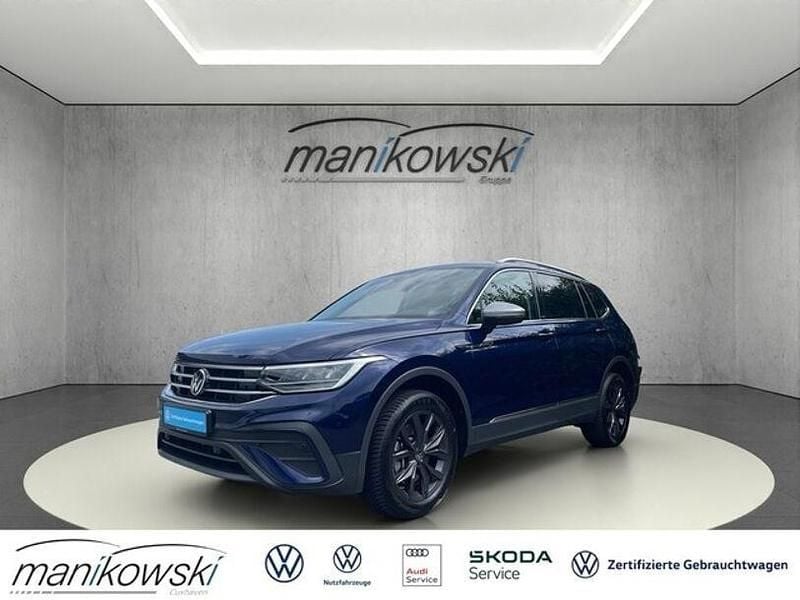 Blau Gebraucht 2024 VW Tiguan Allspace Move SUV | 38.808 € (Superpreis) - Bild 1/4