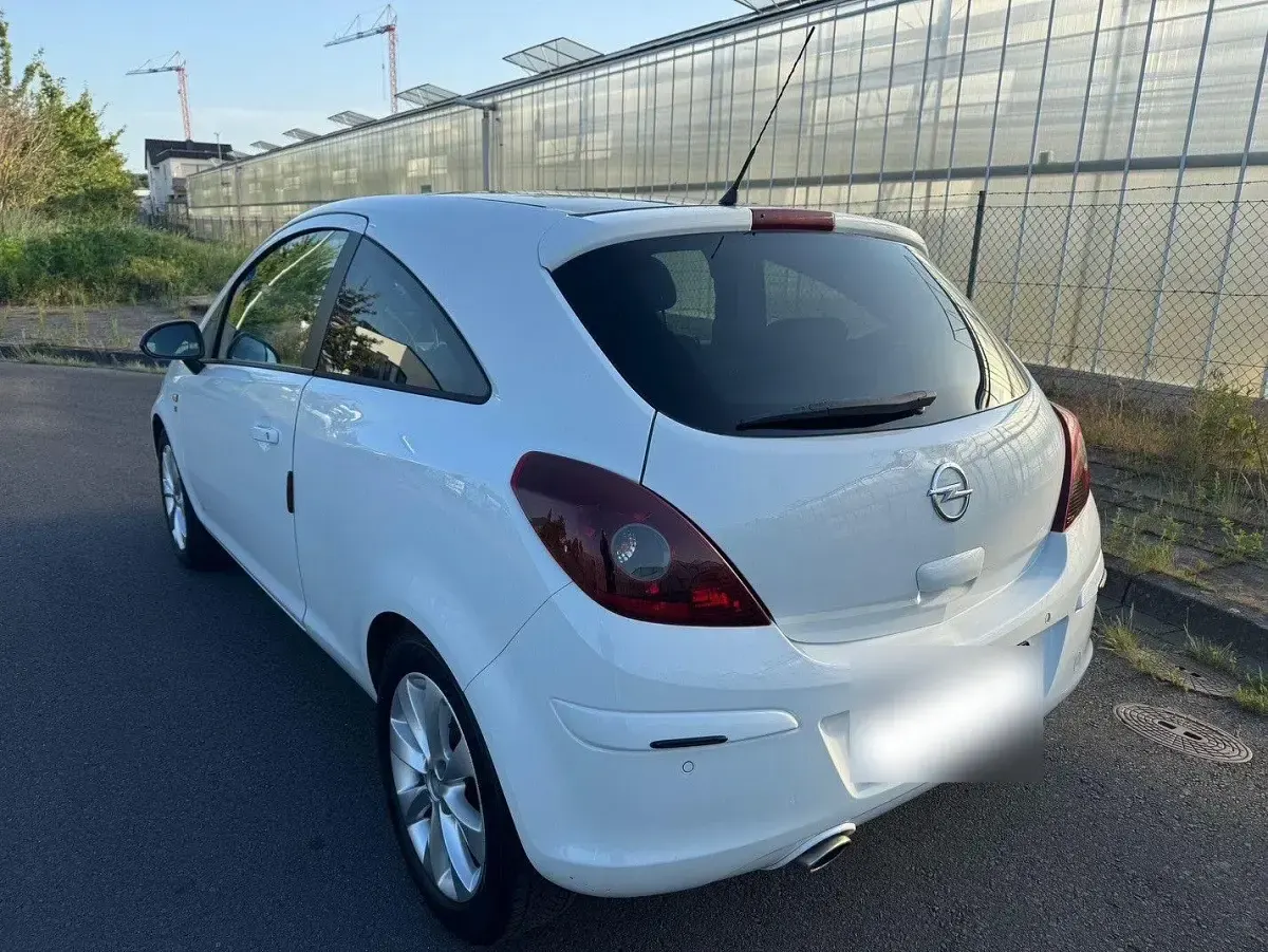 Gebraucht Opel Corsa 87 PS (63 kW) 2012 Weiß Kleinwagen