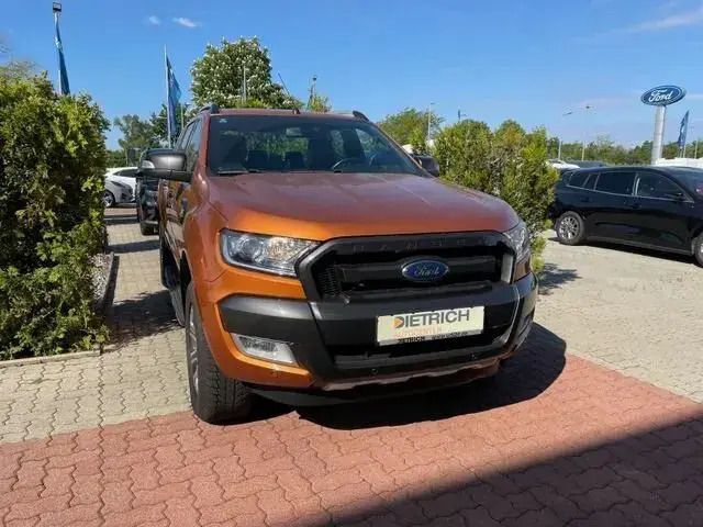 Pride orange Gebraucht 2018 Ford Ranger Wildtrack Abholung | 34.490 € (Fairer Preis) - Bild 1/4