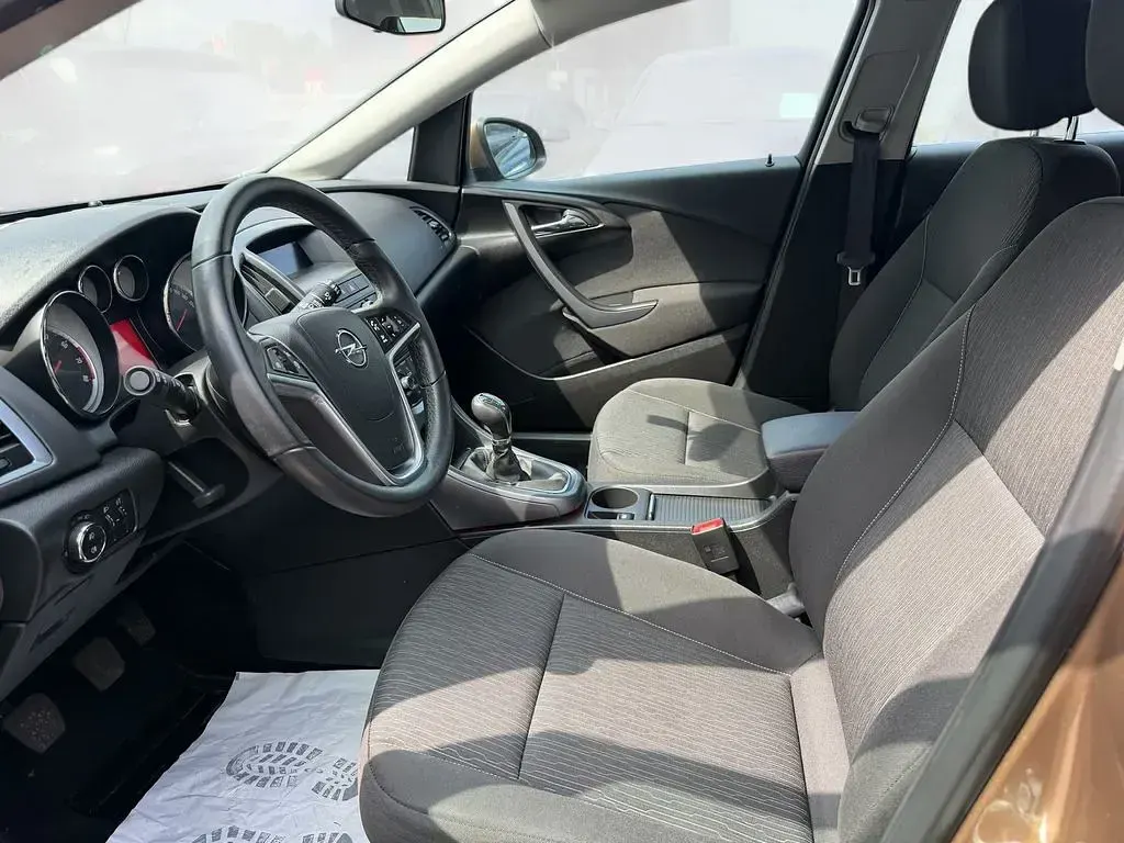 Gebraucht Opel Astra Selection 101 PS (74 kW) 2015 Braun Kleinwagen