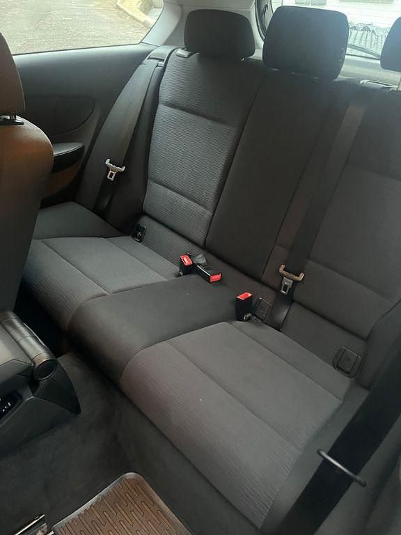 Gebraucht BMW 116 122 PS (89 kW) 2010 Schwarz Kleinwagen