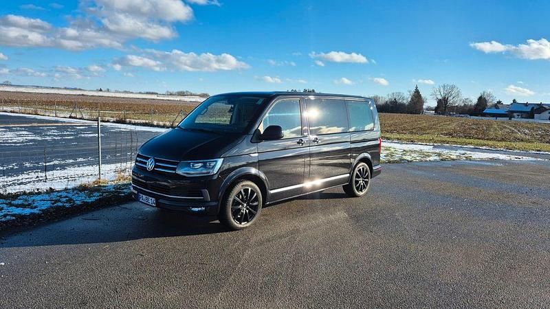Schwarz Gebraucht 2018 VW Multivan Generation Six Van | 40.950 € (Fairer Preis) - Bild 1/4