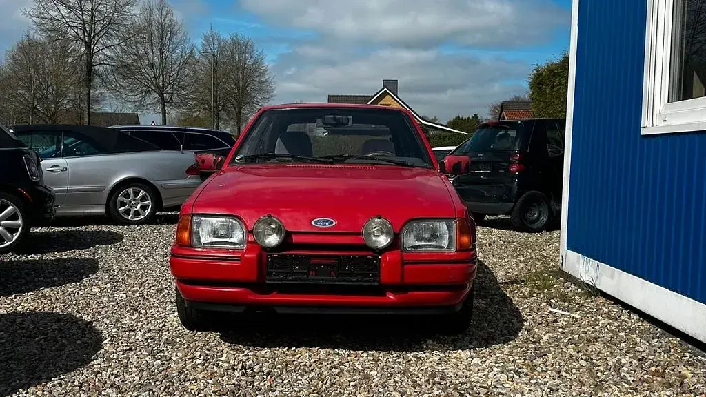 Używany Ford Escort 60 KM (44 kW) 1987 Czerwony Coupe