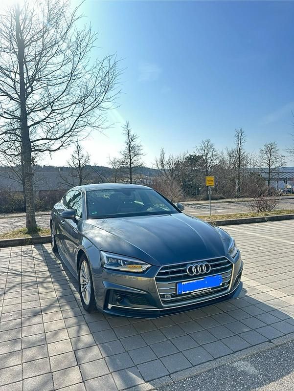 Grau Gebraucht 2019 Audi A5 Sportback S-Line Limousine | 31.500 € (Fairer Preis) - Bild 1/4