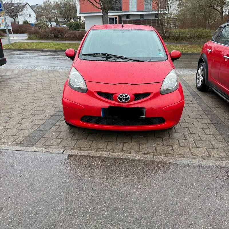 Gebraucht Toyota Aygo 68 PS (50 kW) 2007 Rot Kleinwagen