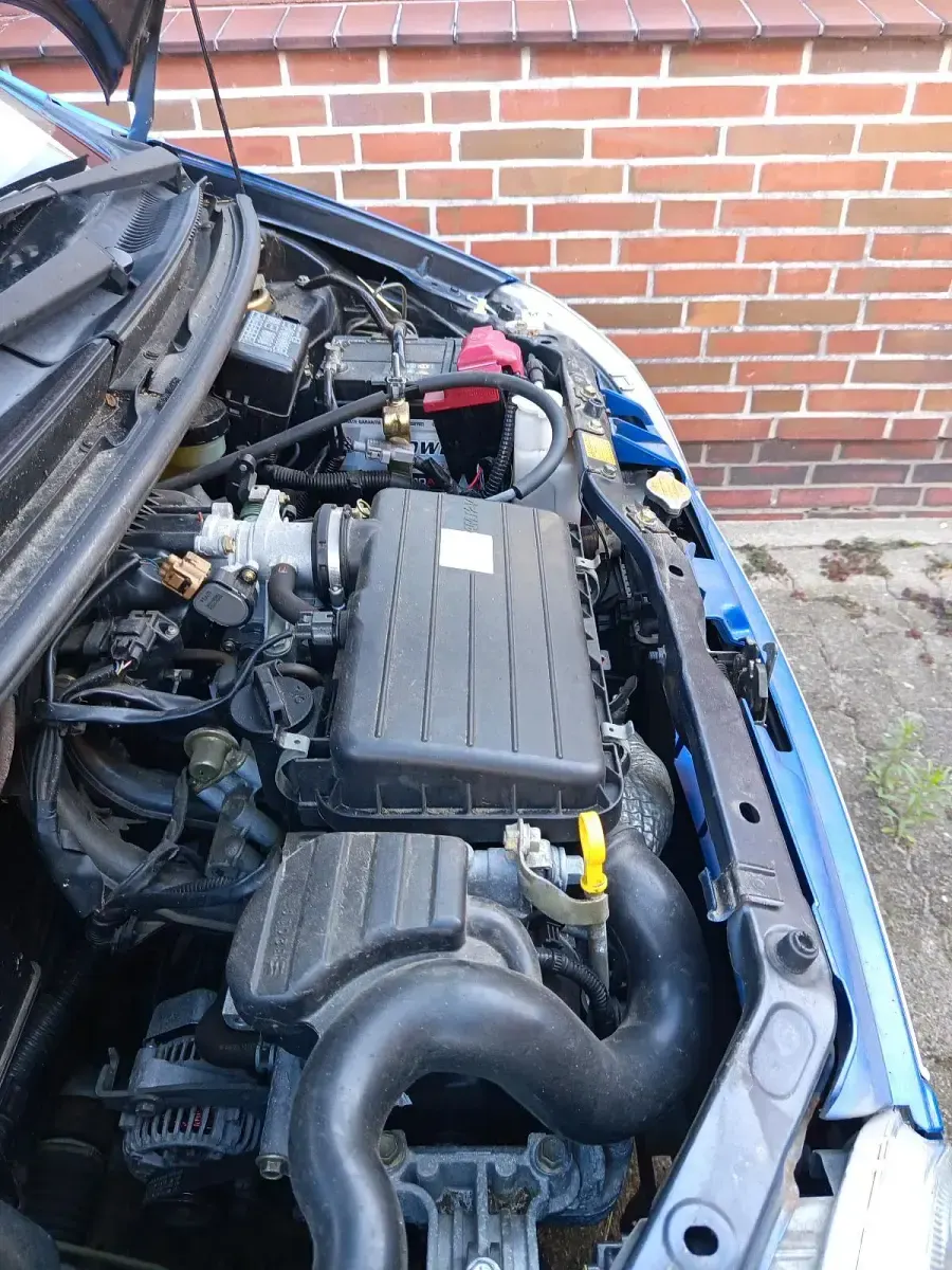 Gebraucht Daihatsu Cuore 54 PS (39 kW) 2004 Blau Kleinwagen