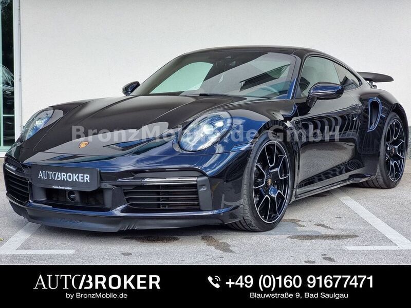 Schwarz Gebraucht 2022 Porsche 992 Coupé | 249.781 € - Bild 1/4