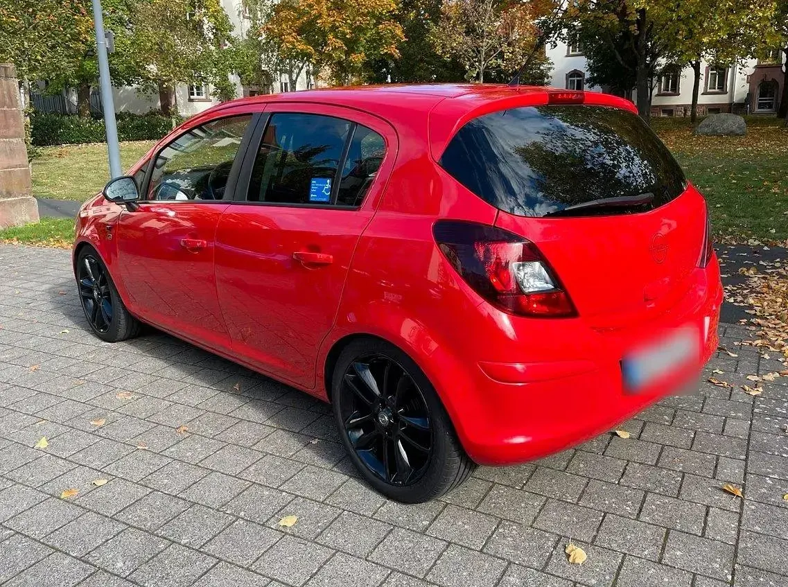 Gebraucht Opel Corsa 86 PS (63 kW) 2011 Rot Kleinwagen