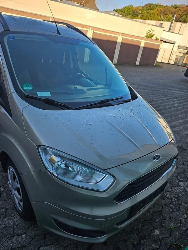 Gold Gebraucht 2014 Ford Tourneo Courier Van / Kleinbus | 4.300 € (Guter Preis) - Bild 1/4
