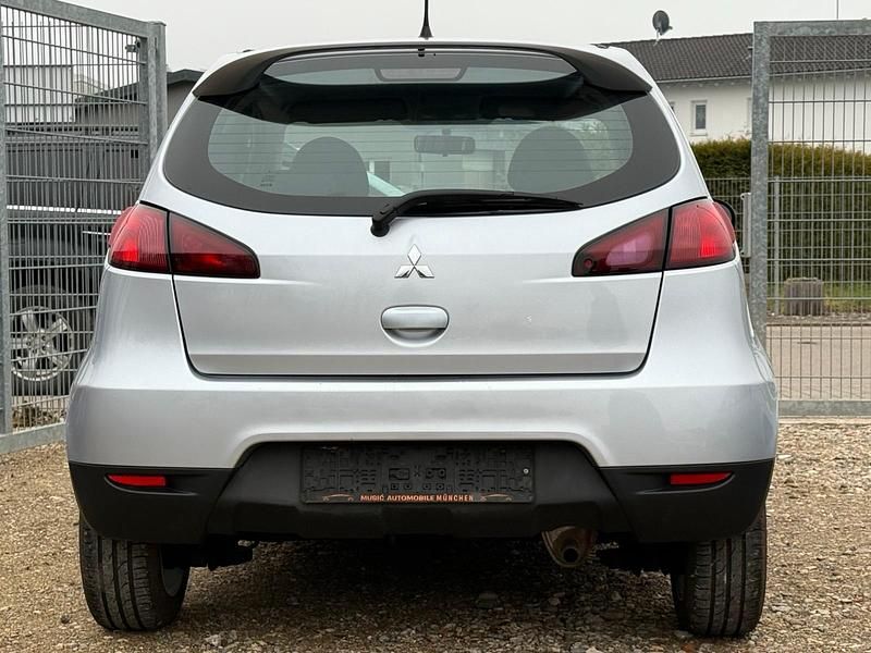 Second-hand Mitsubishi Colt 75 CP (55 kW) 2012 Argintiu Hatchback