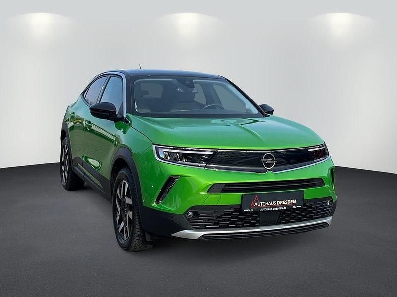 Gebraucht Opel Mokka-e Elegance 100 kW (136 PS) 2022 Matcha green (metallic) SUV